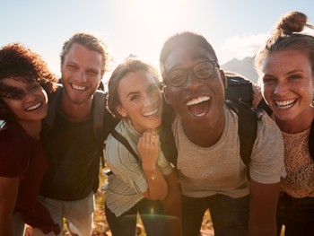 Young adult friends having fun outdoor during a language trip in Germany